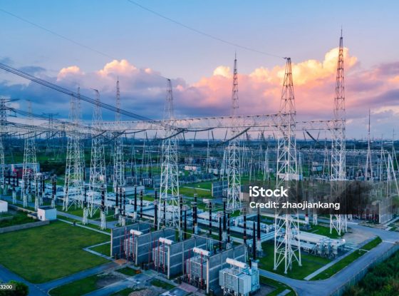 Aerial view of a high voltage substation.Industrial power tower background.